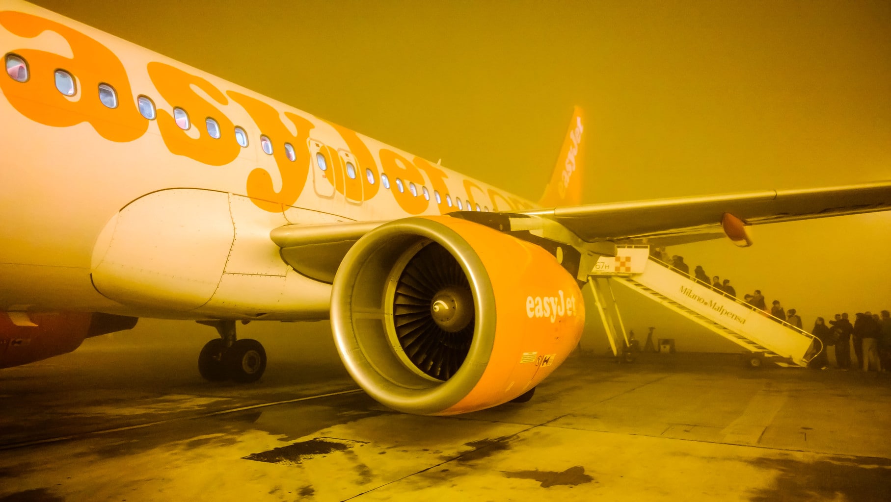 Boarding an easyJet plane on a misty night
