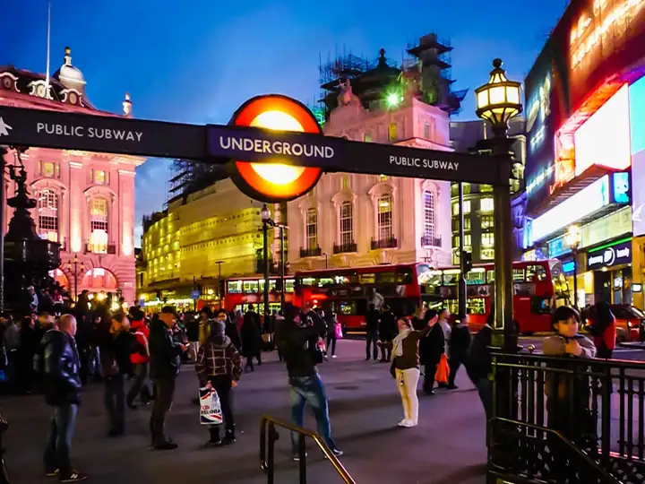 Leaving underground station and ready to mingle in busy London street