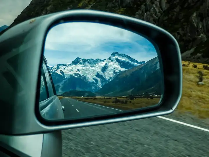 Looking back on Mt Cook (rearview mirror)