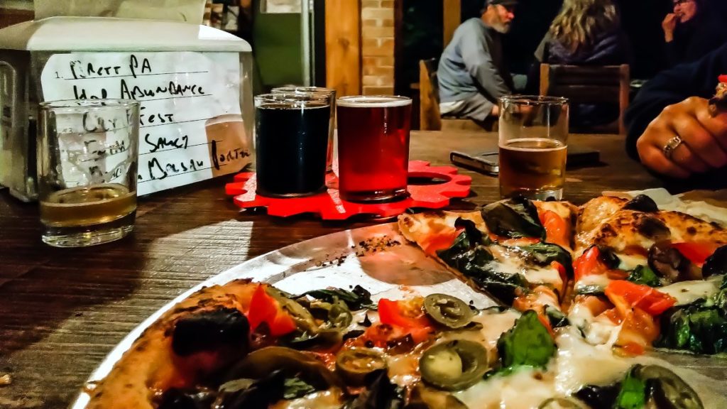 Pizza and tasting flight at Innovation Brewing