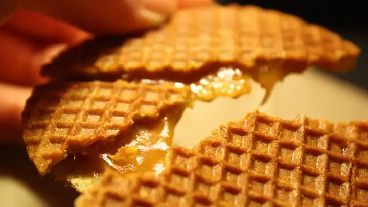 Close-up of a stroopwafel - syrup waffle - breaking apart