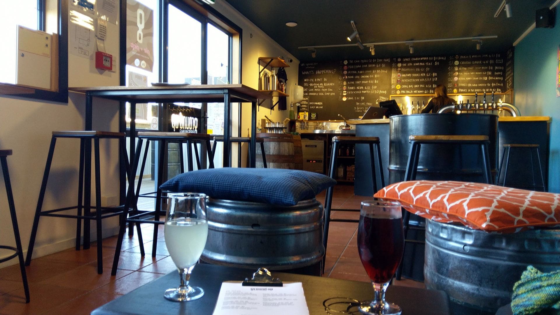 Overview of the Ground Up taproom Wanaka - bar & taps + beer menu in the background