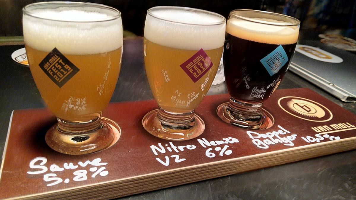 Van Moll tasting flight: 3 glass craft beer > two yellow coloured, one black