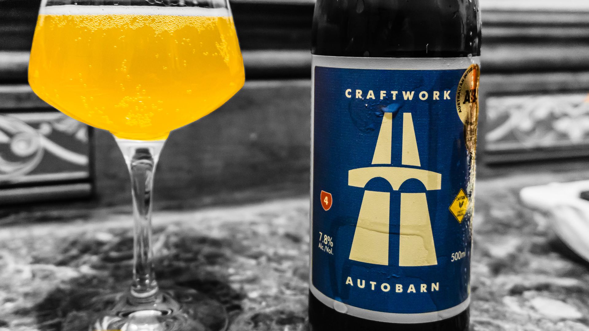 Glass of beer and a bottle of Autobarn by Craftwork